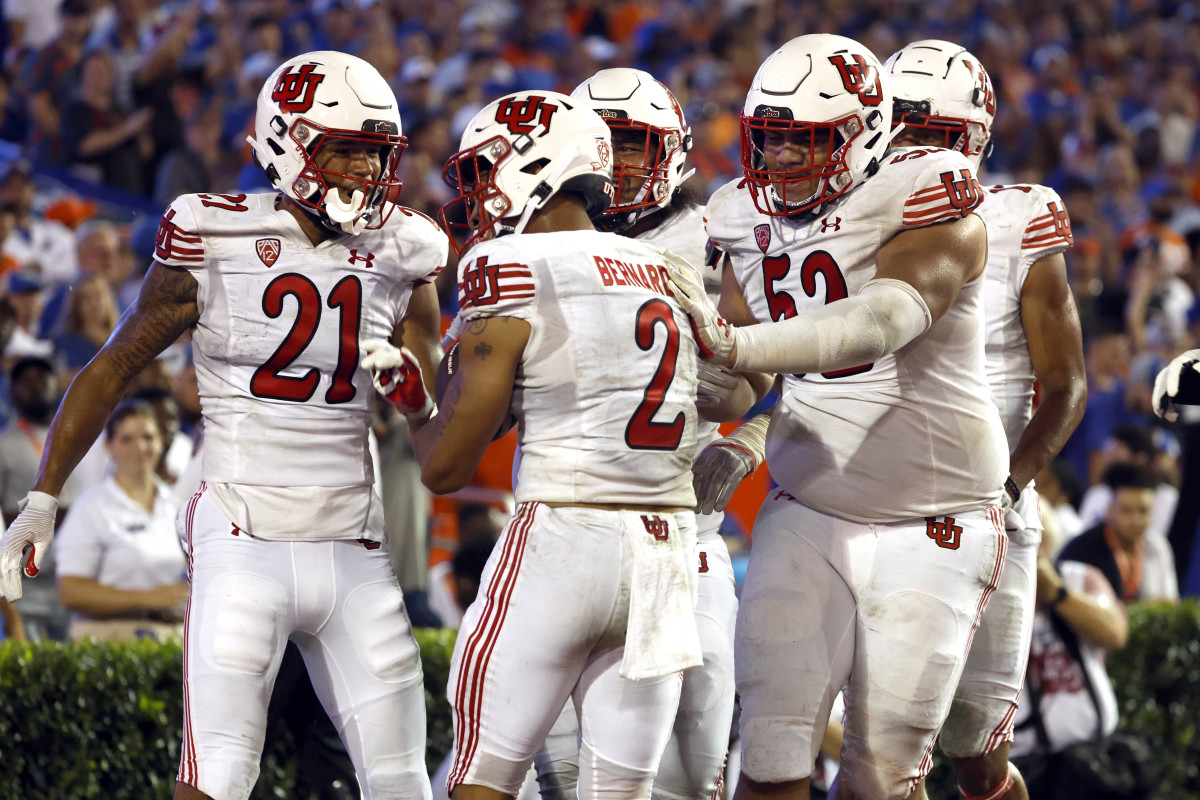 Utah Utes running back Micah Bernard (2) celebrates after scoring a touchdown against the Florida Gators during the second half at Steve Spurrier-Florida Field.